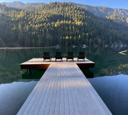 The Flux outdoor chairs by the lake at the cottage